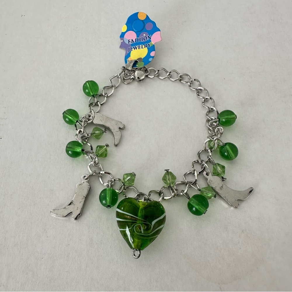 Silver colored metal charms & glass beads adjustable metal bracelet